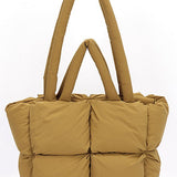 Babe Beachwear small puffer lightweight tote bag in tan with quilted padded design and dual handles