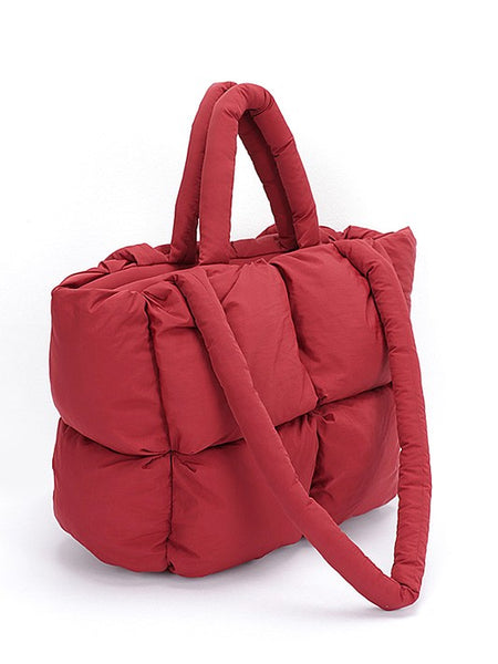 Red small puffer lightweight tote bag by Babe Beachwear with padded handles and quilted design