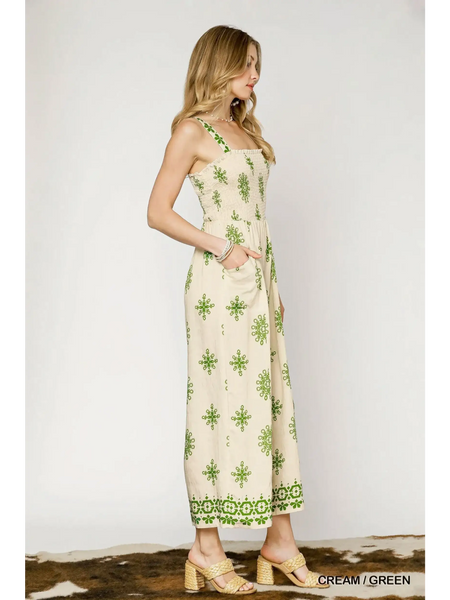 Babe Beachwear smocked wide leg jumpsuit in cream with green floral print and adjustable straps