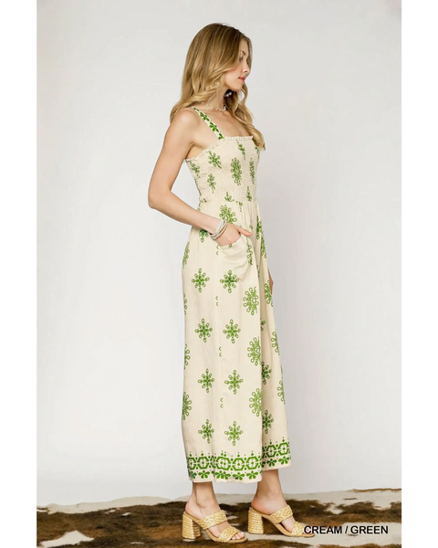 Babe Beachwear smocked wide leg jumpsuit in cream with green floral print and adjustable straps