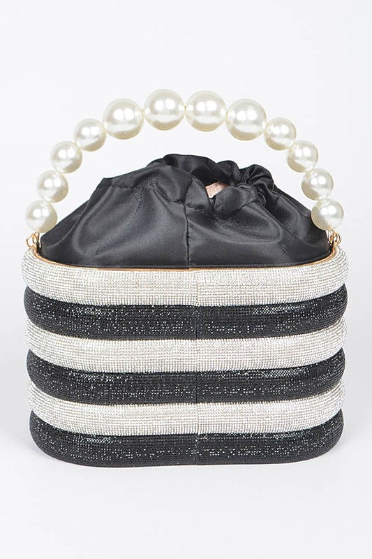 Artini Accessories Sparkle Striped Bucket Bag with Gold Detail featuring black and white stripes and pearl handle