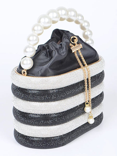 Sparkle Striped Bucket Bag with Gold Detail featuring black and white stripes and a pearl handle