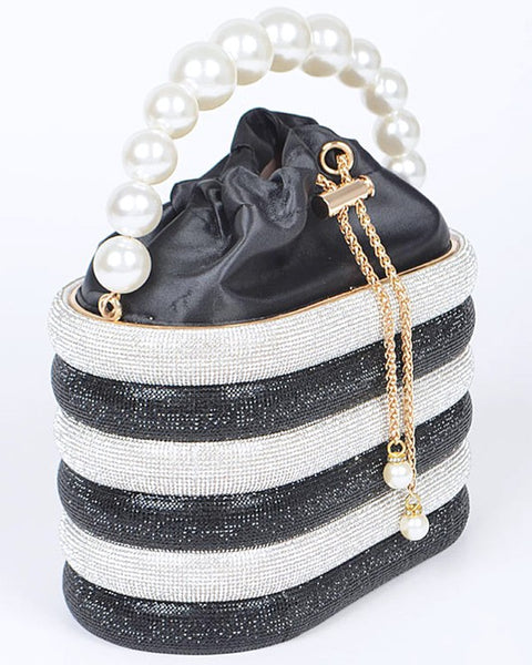 Sparkle Striped Bucket Bag with Gold Detail featuring black and white stripes and a pearl handle