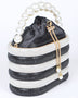 Sparkle Striped Bucket Bag with Gold Detail featuring black and white stripes and a pearl handle