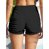 Black sporty swim shorts for women by Beach Babes with ruched sides ideal for active beachwear