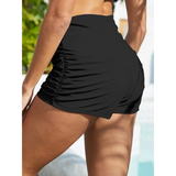 Black sporty swim shorts for women by Beach Babes with ruched sides and comfortable fit