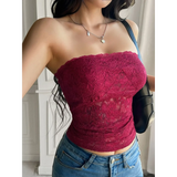 Babe Beachwear strapless lace crop top in deep red worn with blue jeans and a black shoulder bag