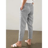 Babe Beachwear striped beach pants for women with black and white vertical stripes and elastic waistband