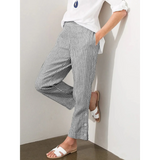 Babe Beachwear striped beach pants for women in black and white with side button details