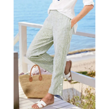 Babe Beachwear striped beach pants for women in white and green with side buttons and relaxed fit