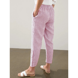 Babe Beachwear striped beach pants for women in pink and white with a relaxed fit and side pockets