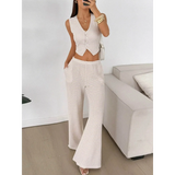 Babe Beachwear striped knit vest and pants set in neutral tones with sleeveless button-up top and wide-leg pants