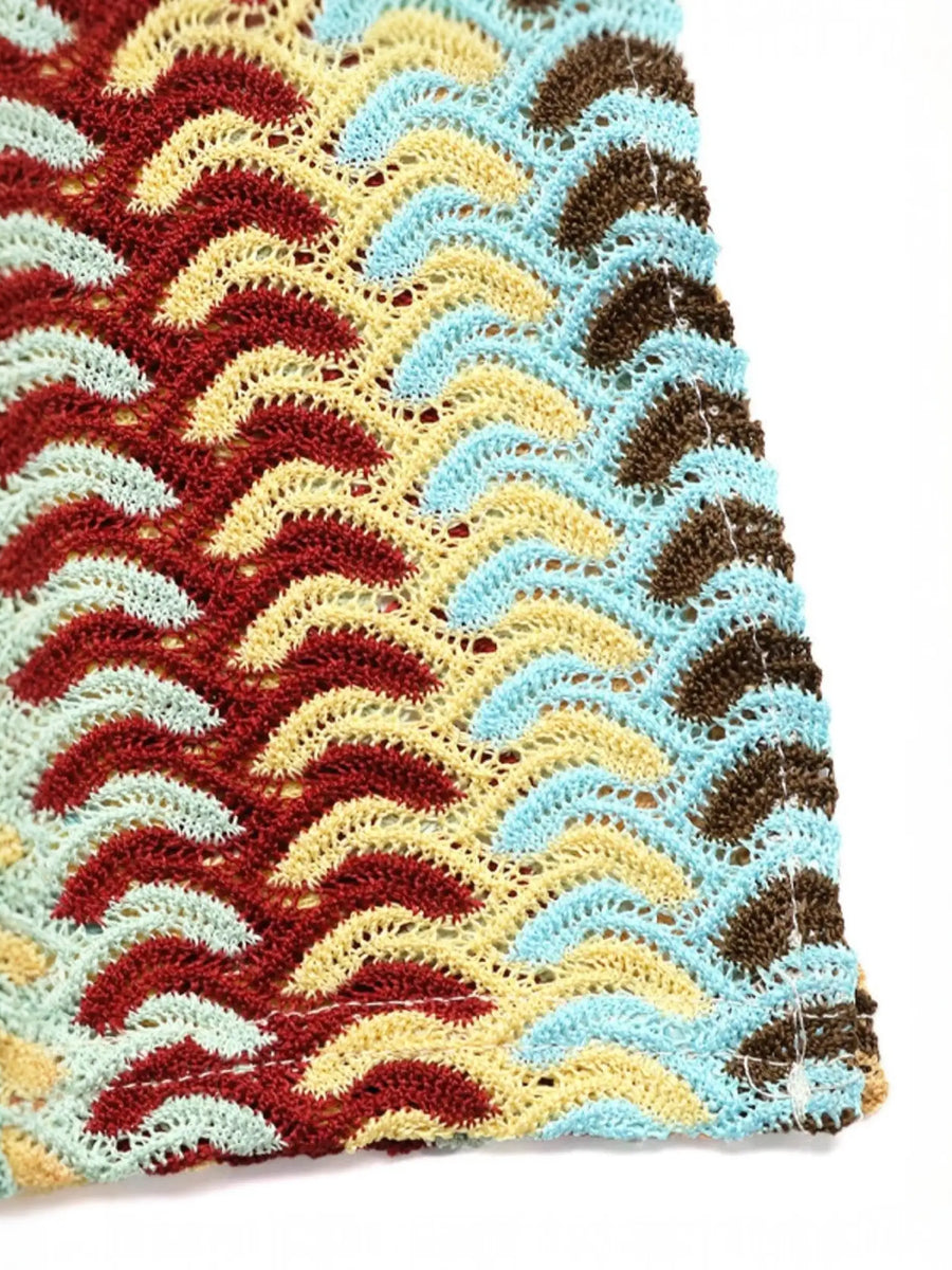 Close-up of colorful knit pattern on Babe Beachwear striped midi beach dress fabric