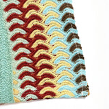 Close-up of colorful knit pattern on Babe Beachwear striped midi beach dress fabric