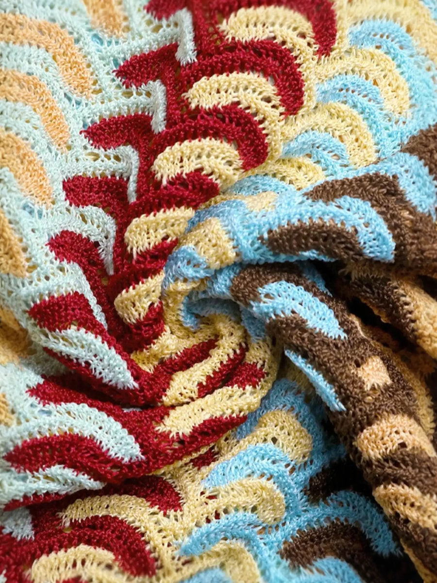 Close-up of textured fabric with colorful stripes for Babe Beachwear striped midi beach dress