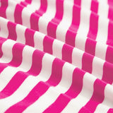Close-up of EG fashion striped midi dress summer fabric with pink and white stripes