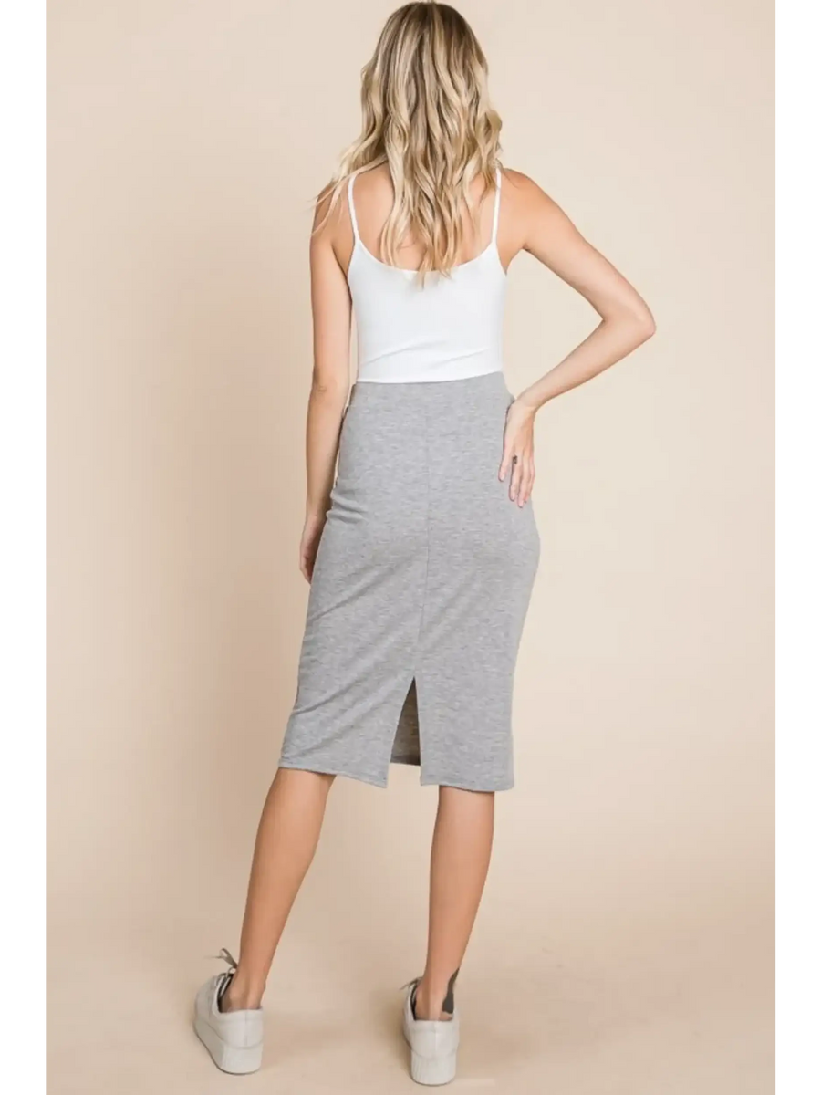 Back view of stylish gray knit midi pencil skirt dress by Babe Beachwear worn with white tank top and sneakers