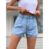 Trendsi stylish lightweight denim shorts in light blue worn with a white crop top casual summer outfit