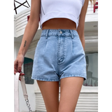 Trendsi stylish lightweight denim shorts worn with a white crop top outdoors