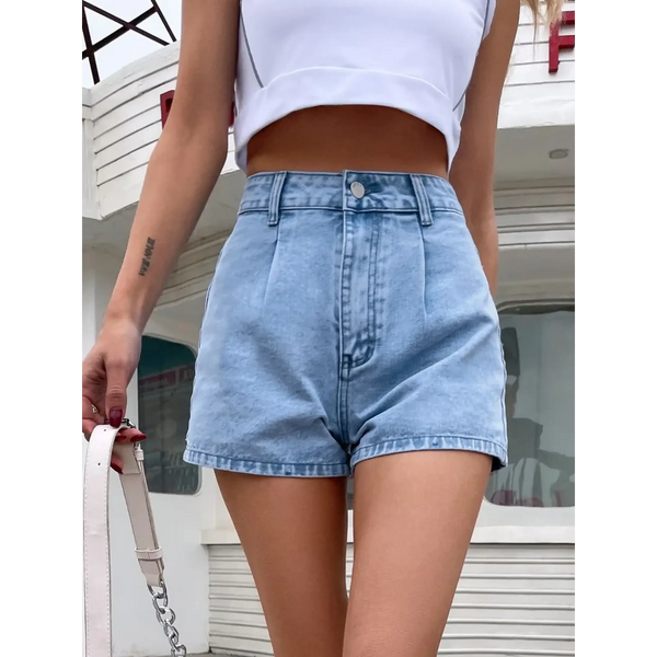 Trendsi stylish lightweight denim shorts worn with a white crop top outdoors