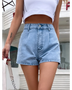Trendsi stylish lightweight denim shorts worn with a white crop top outdoors