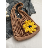 Babe Beachwear summer crochet tote 2025 in brown with yellow flower detail on denim background