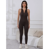 Trendsi black active jumpsuit with zipper front modeled by woman for summer fitness jumpsuit ladies