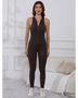 Trendsi black active jumpsuit with zipper front modeled by woman for summer fitness jumpsuit ladies