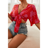 Babe Beachwear  summer floral tie front blouse in red with pink floral print and short sleeves tied at the front
