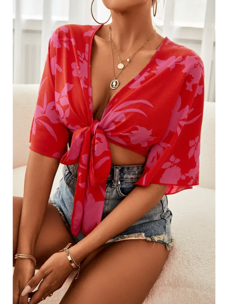 Babe Beachwear  summer floral tie front blouse in red with purple floral print and short sleeves styled with denim shorts