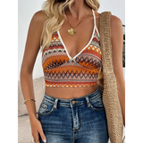 Summer Halter boho crochet crop top by Babe Beachwear in orange and brown tones worn with high waist jeans