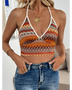 Summer Halter boho crochet crop top by Babe Beachwaer in orange and brown worn with denim jeans
