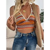 Summer Halter boho crochet crop top with orange and brown patterns by Babe Beachwaer styled with denim jeans