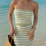 Trendsi summer knit skirt and top set worn by woman at the beach with striped design and strapless fit