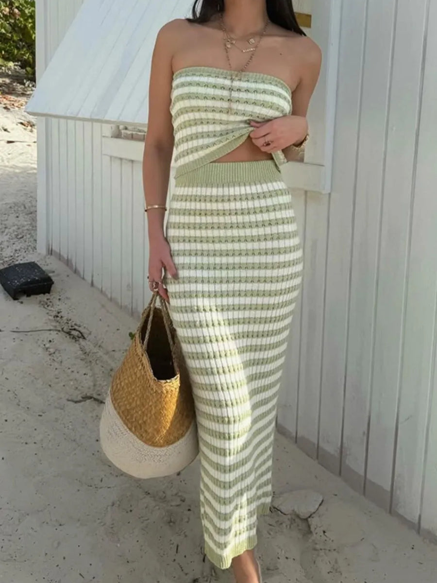 Trendsi summer knit skirt and top set in green and white stripes worn with layered necklaces and a woven handbag