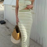 Trendsi summer knit skirt and top set in green and white stripes worn with layered necklaces and a woven handbag