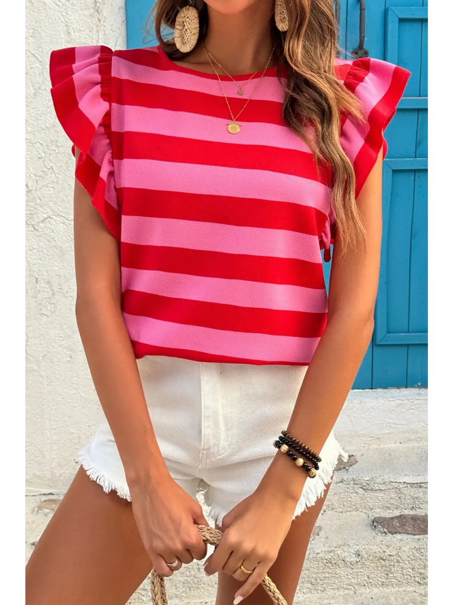 Pink and Red sleeveless striped ruffle sleeve summer top in red and pink worn with white shorts