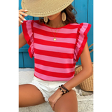 Sleeveless striped ruffle sleeve summer top in red and pink worn with white shorts