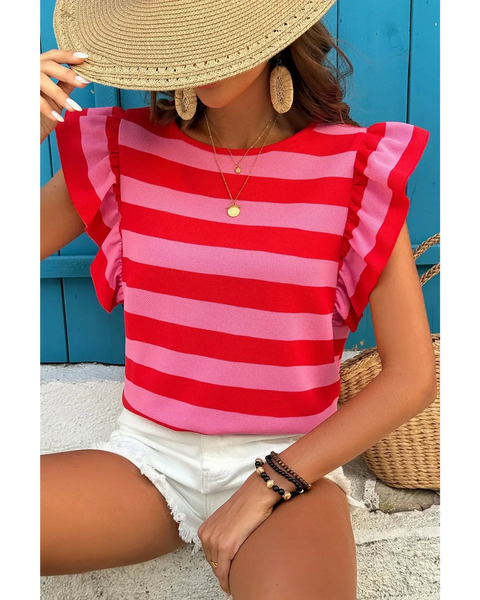 Sleeveless striped ruffle sleeve summer top in red and pink worn with white shorts