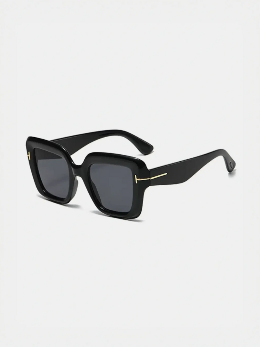 Black square sunglasses perfect for beach vacations and stylish beach looks
