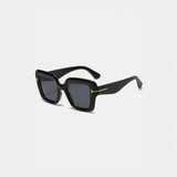 Black square sunglasses perfect for beach vacations and stylish beach looks