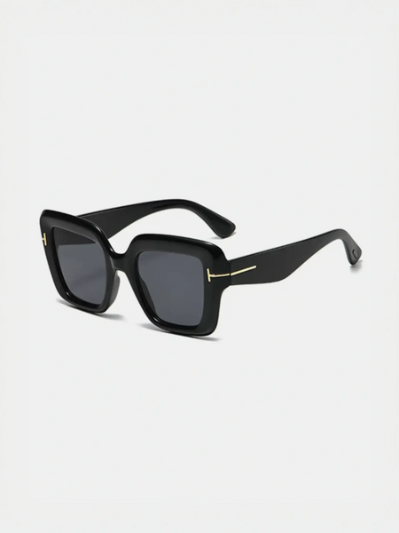 Black square sunglasses perfect for beach vacations and stylish beach looks