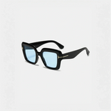 Black square sunglasses with blue lenses perfect for beach vacations and beach styles