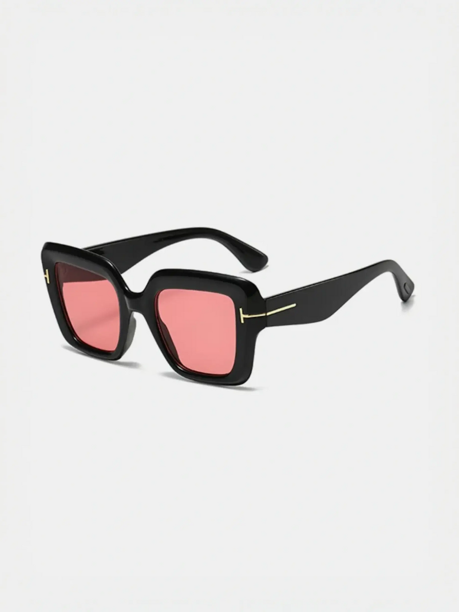 Black square sunglasses with pink lenses perfect for beach vacations and beach styles