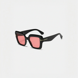 Black square sunglasses with pink lenses perfect for beach vacations and beach styles