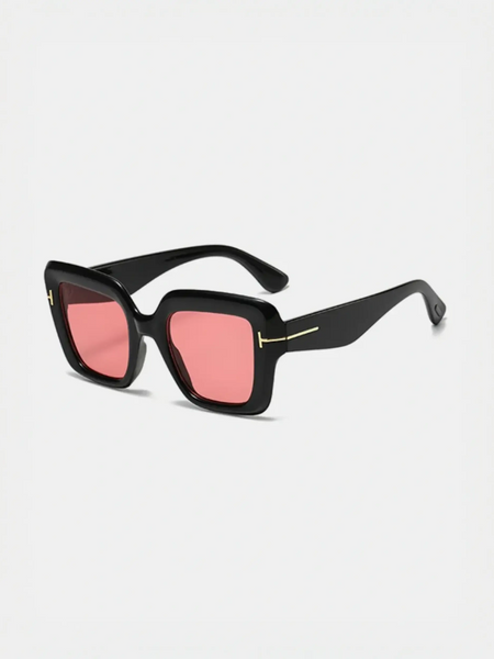 Black square sunglasses with pink lenses perfect for beach vacations and beach styles