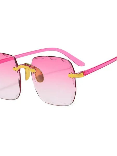 Chic sunglasses with rimless pink gradient for a stylish, stunning look