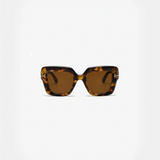 Tortoiseshell-framed sunglasses with brown lenses perfect for beach vacations and styles