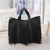Black Babe Beachwaer Super Boho Fringe Woven Tote bag with textured fringe design and sturdy handles