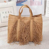 Babe Beachwear Super Boho Fringe Woven Tote bag in natural tan color with fringe details